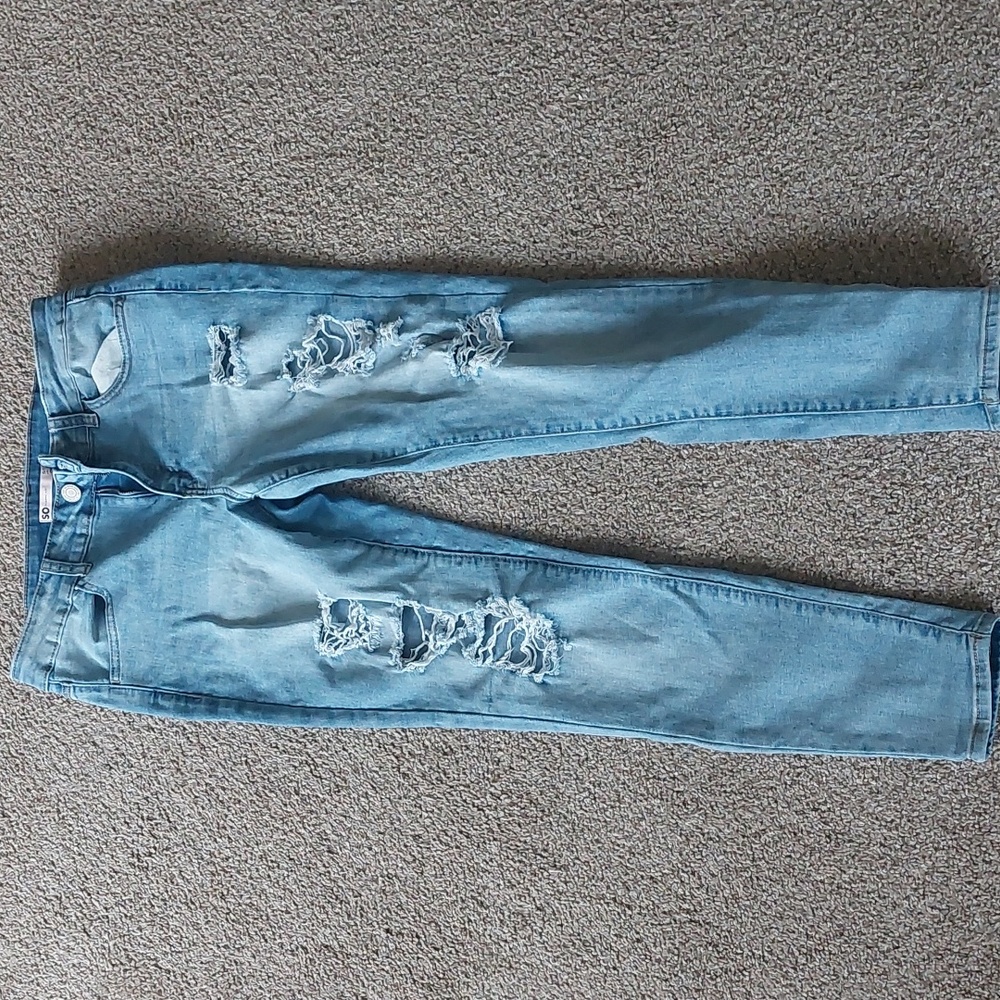 Light blue low rise ripped jeggings